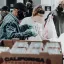 People pack groceries at a food bank. Credit: Joel Muniz, Unsplash
